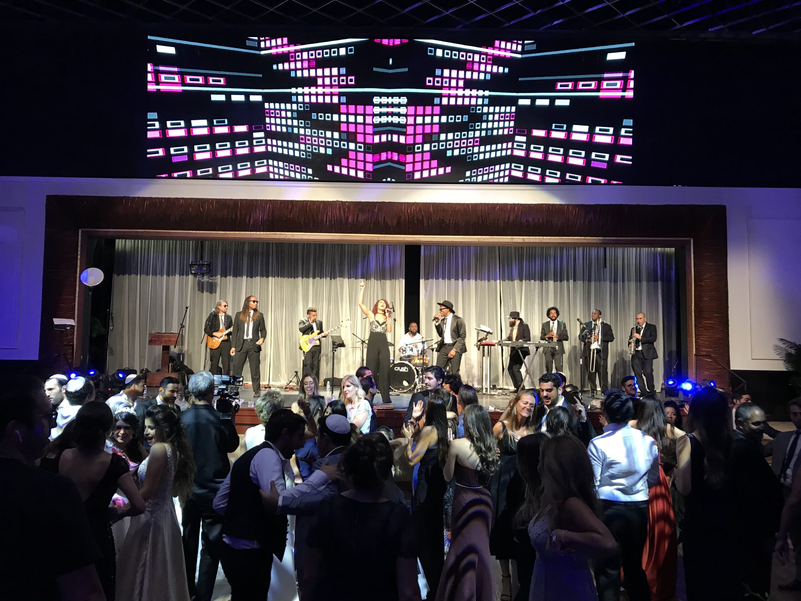 LED screens behind a live band